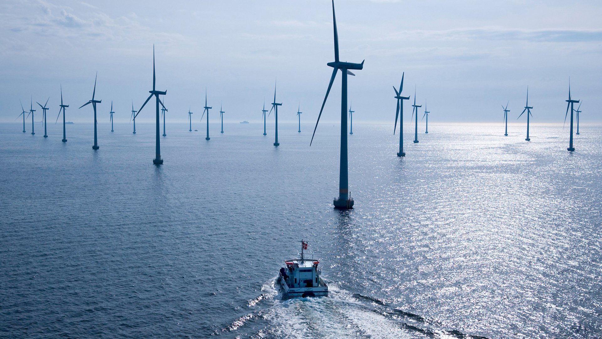 wind turbines sea horizon ships wind sky of the blade screw