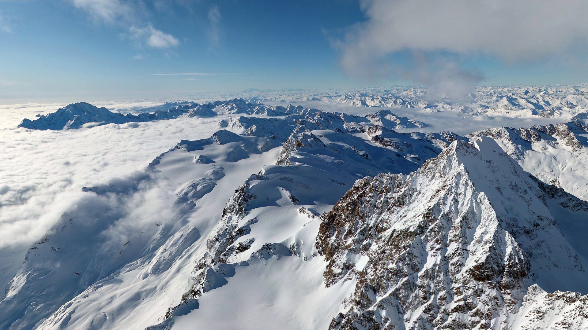 montañas alpes picos nieve cielo nubes