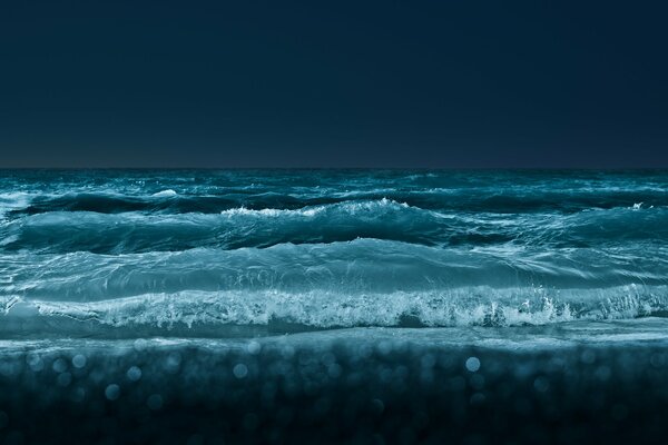 Waves on the lake at night