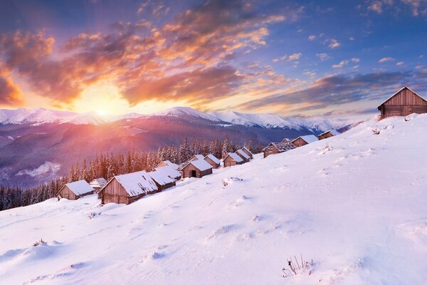 Houses on a snowy peak