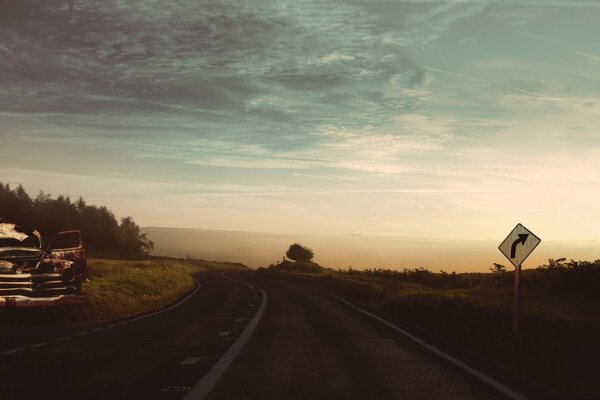 Retro car on the background of the road