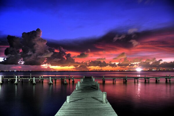 Lilac sky on the pier in the evening