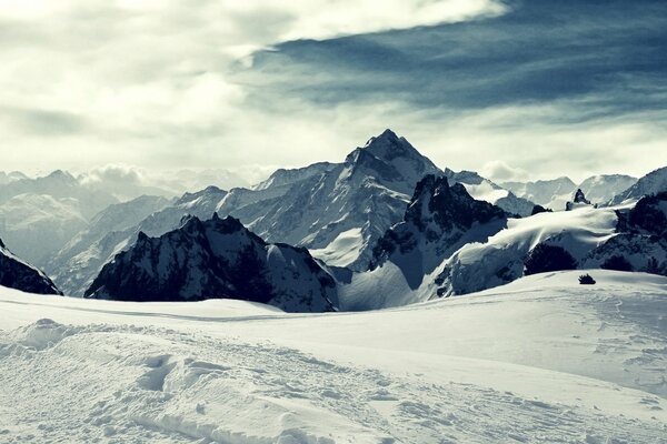 Silhouette on a snowy peak