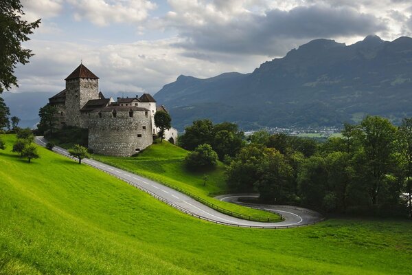 An ancient castle on a green hill