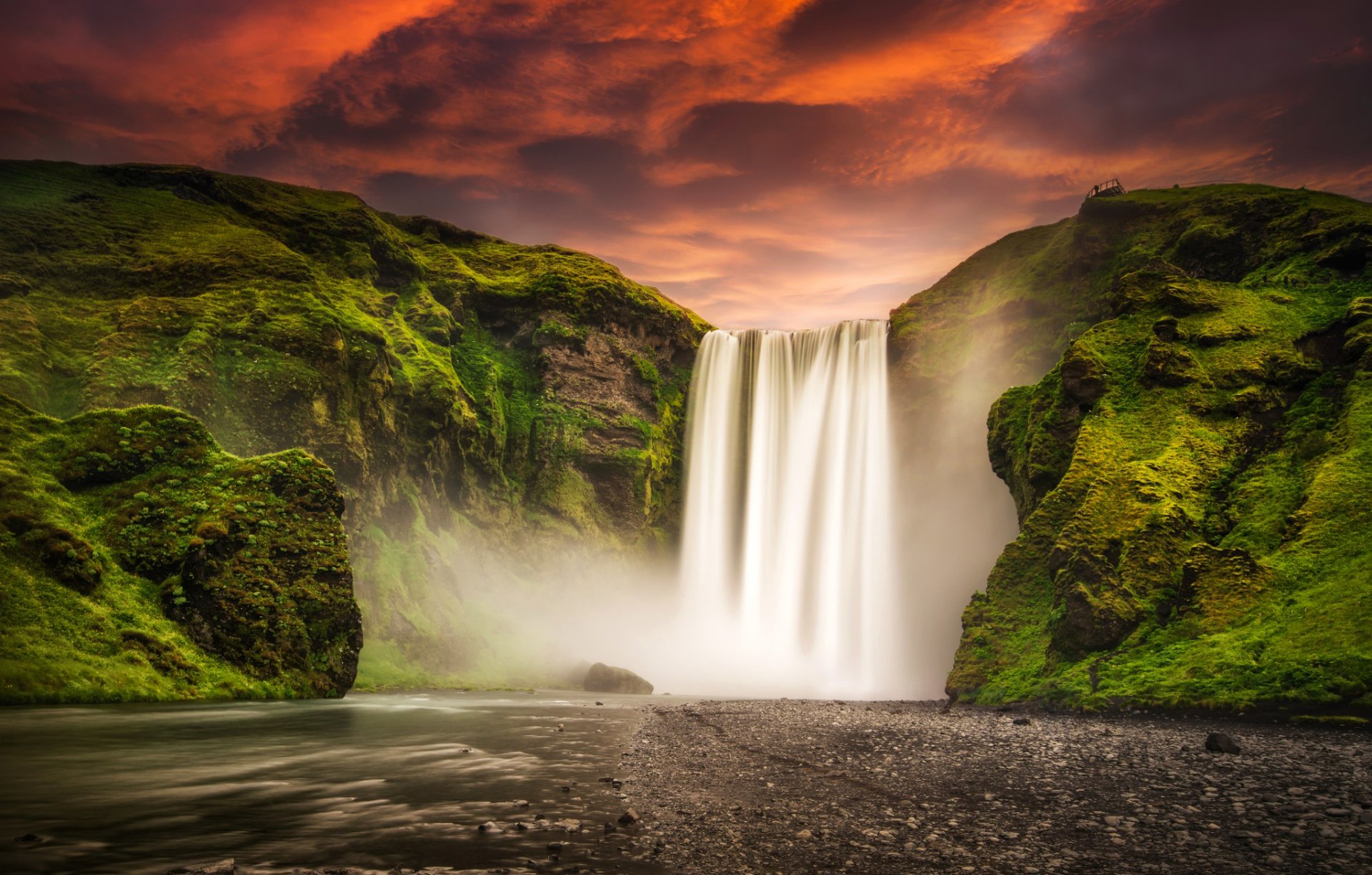 islandia skogafoss wodospad skogafoss góry rzeka zachód słońca niebo natura