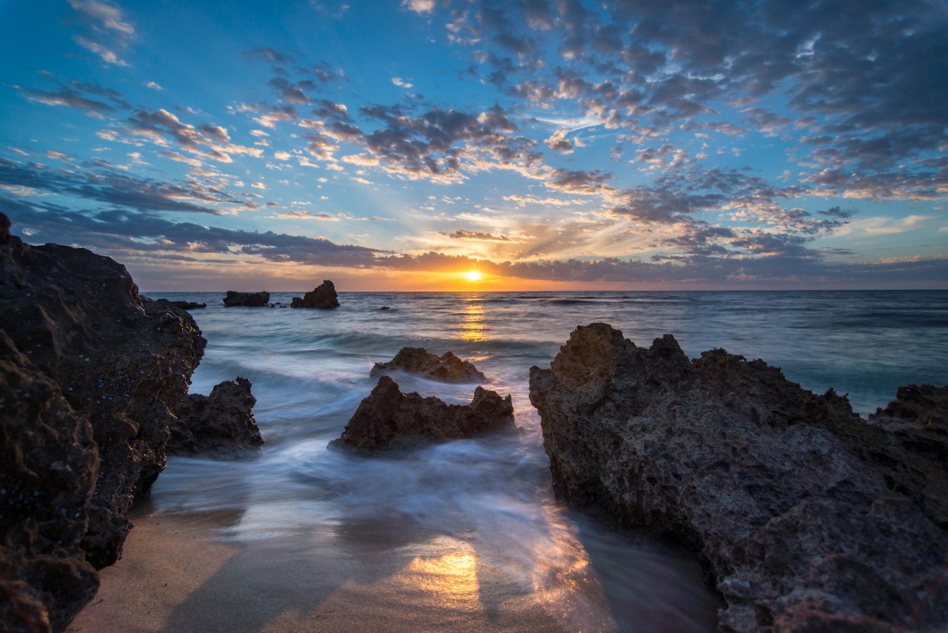 unrise sea beach shore rocks landscape