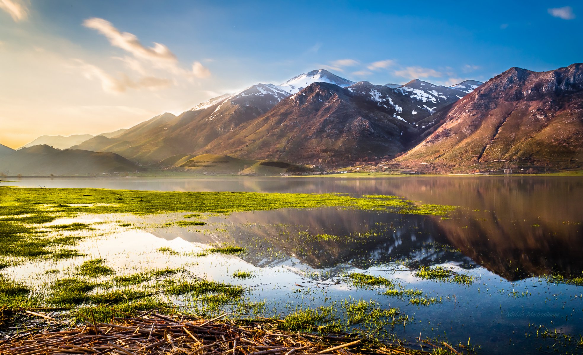 italy lake mountain grass water sky nature landscape