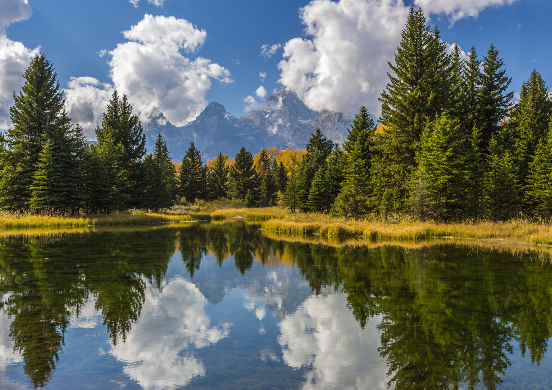 góry lasy drzewa woda odbicie niebo słońce chmury usa park narodowy grand teton grand teton