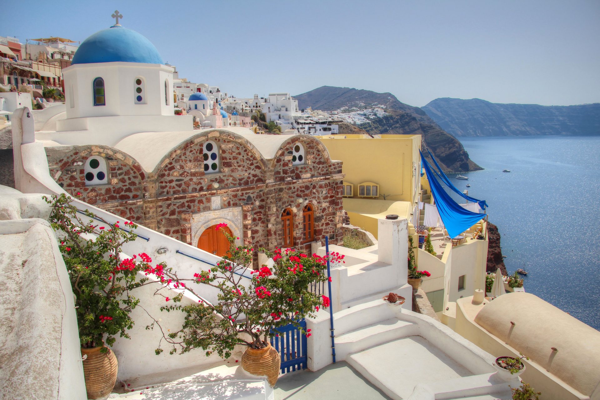 greece santorini sky mountain sea church house yard flower