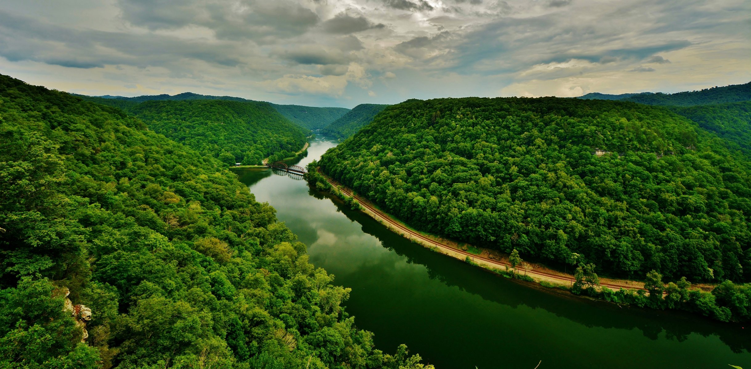 mountains trees sky clouds river landscape