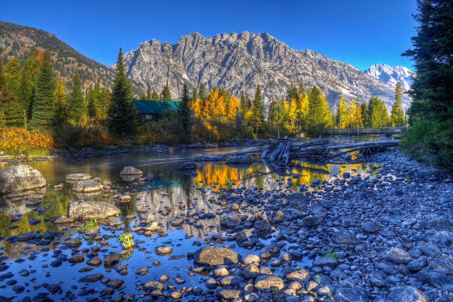 grand teton national park wyoming united states mountain lake river reflection tree spruce sky house autumn hdr