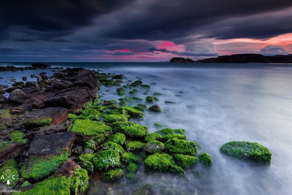 Rocky shore under the evening sky