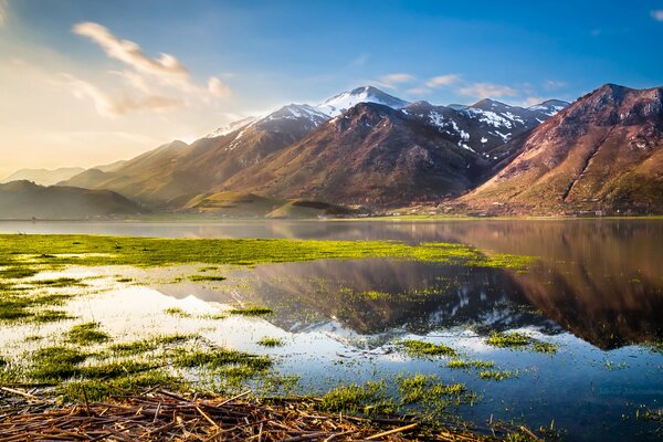 Italian landscape with lake and mountains