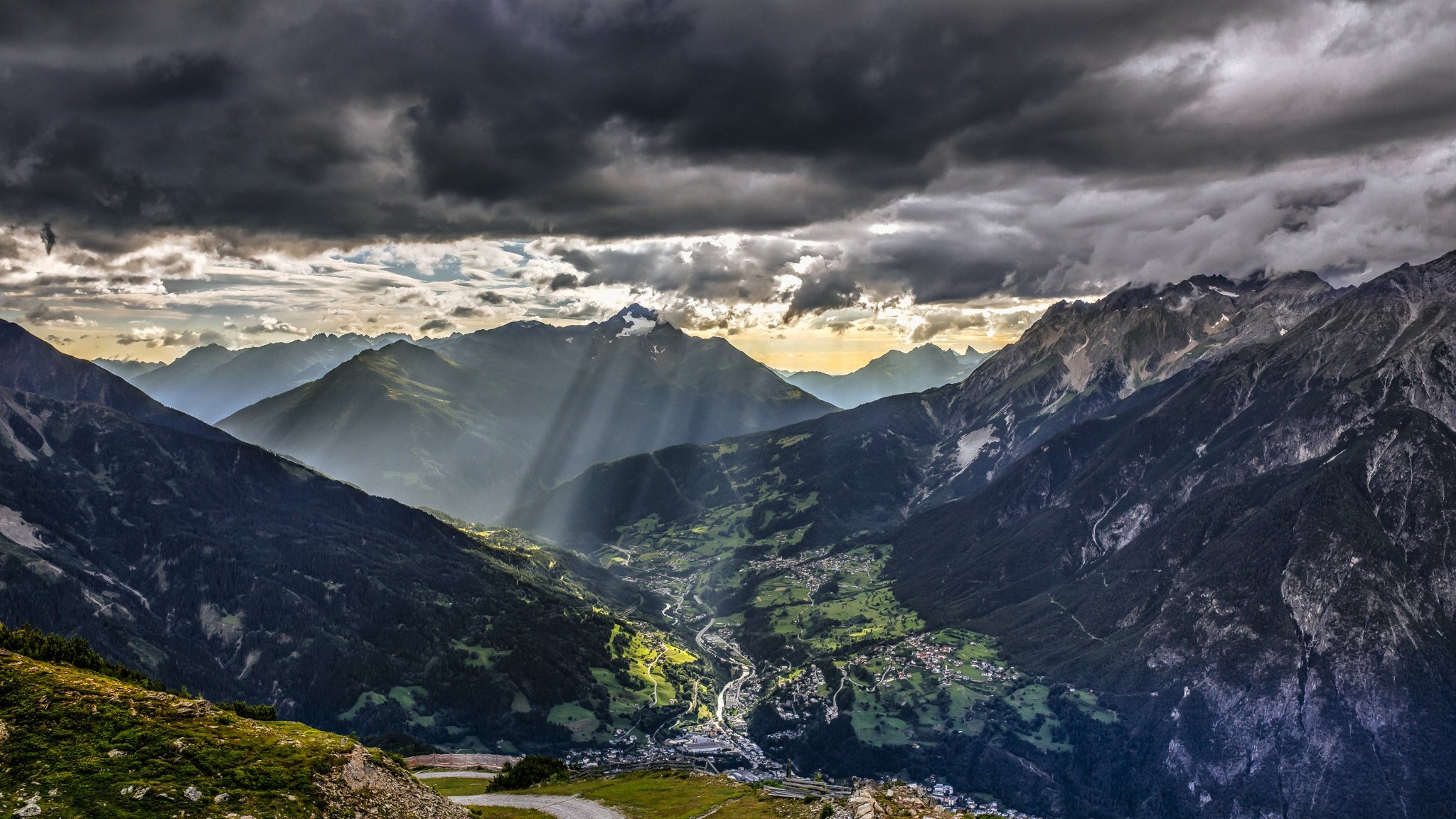 torsten muehlbache alps blue dark europe green landscape mountain nature red sun sunset thunderstorm clouds rays mountains road city sky hd