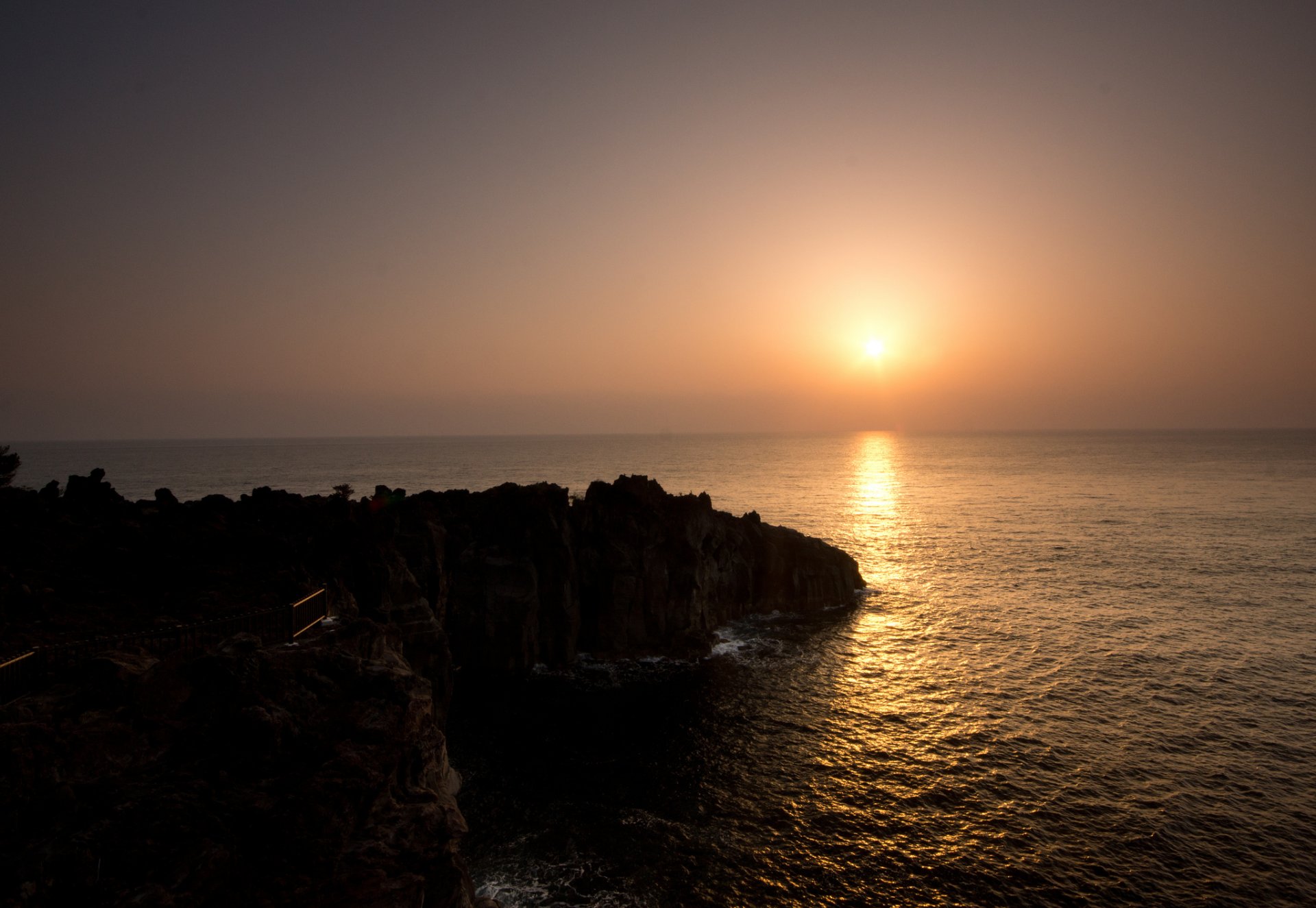 mare roccia sole alba