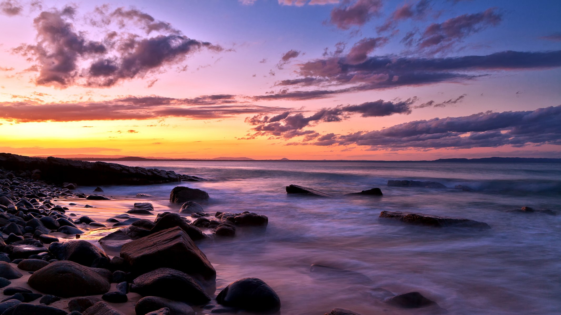 sonnenuntergang meer felsen landschaft