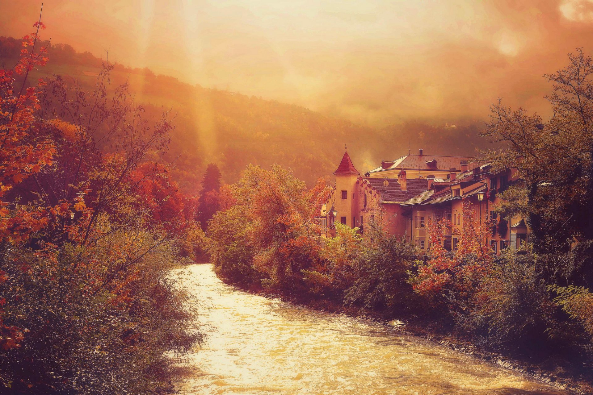 herbst berge fluss stadt häuser bäume laub licht strahlen natur landschaft