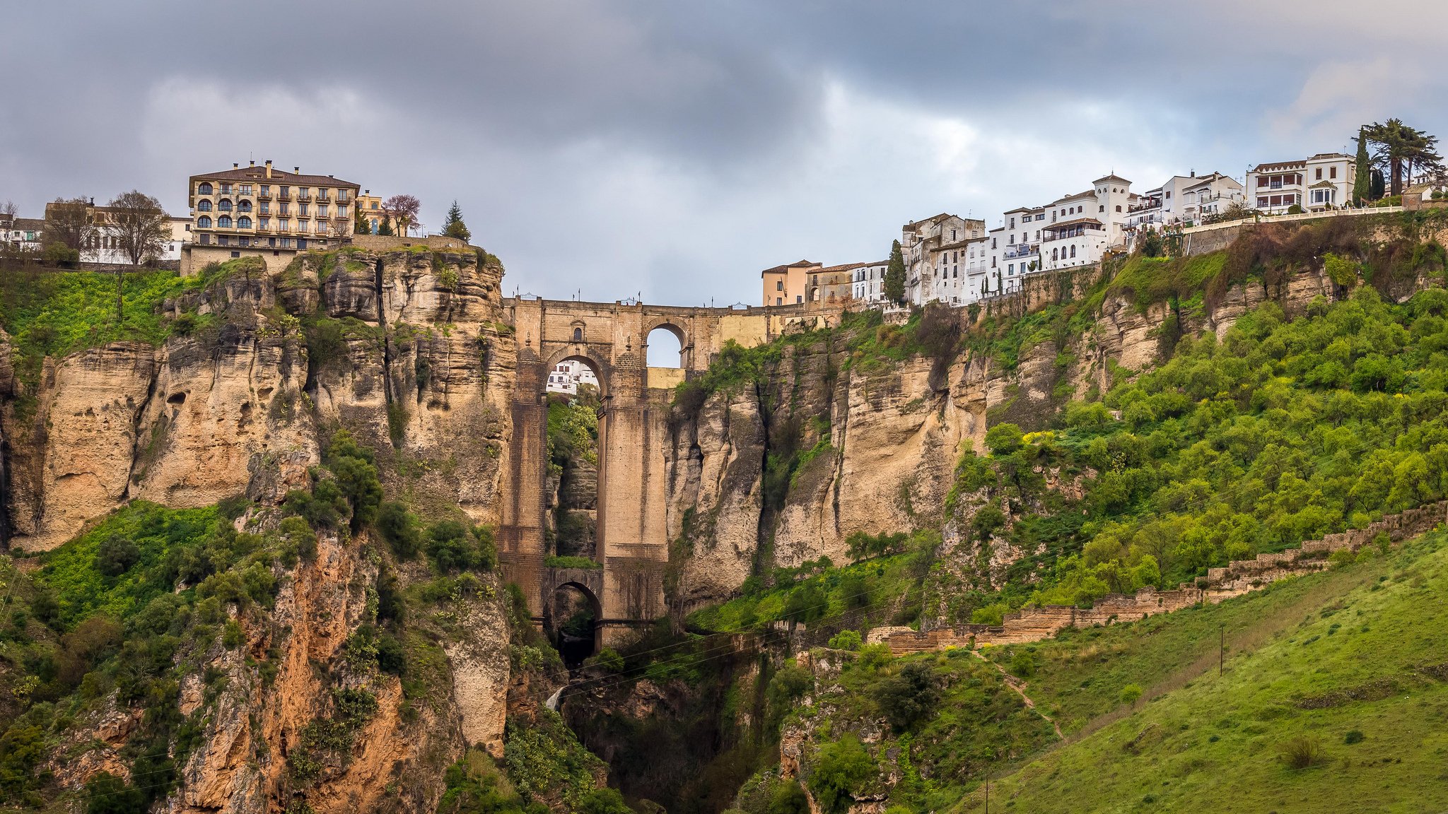 ronda malaga spain town rock sky house bridge valley