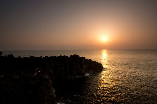 Sunrise sea cliff