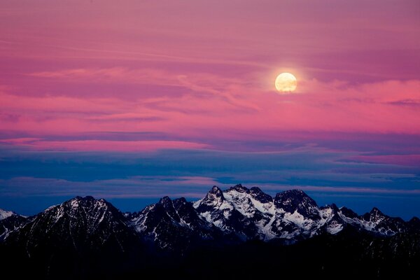 Alpine mountains and pink sunset