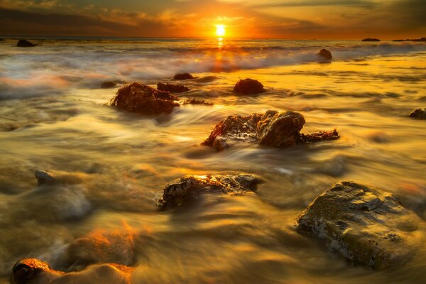 Sunset on the stone beach of Malibu