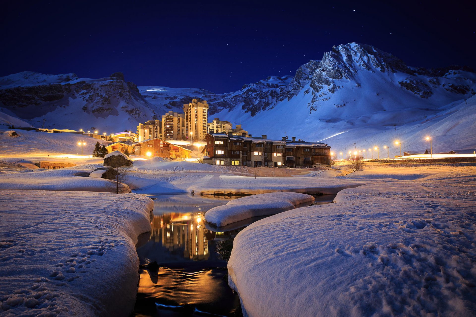 mountain winter snow cottages resort river night