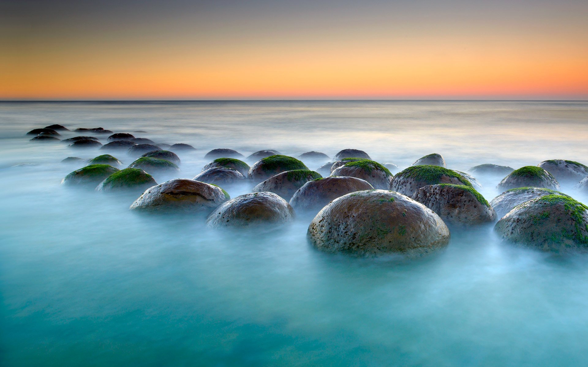 dot arena californie états-unis ciel coucher de soleil mer pierres ballon algues