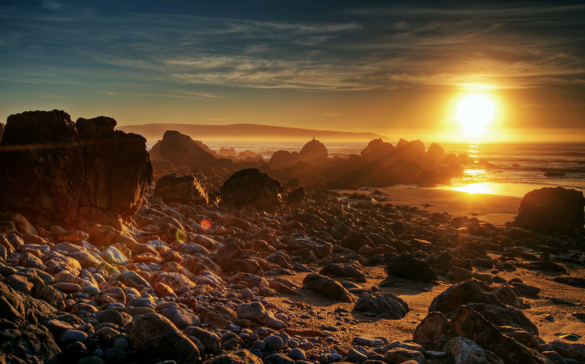 alba tramonto sole natura mare pietre spiaggia foto