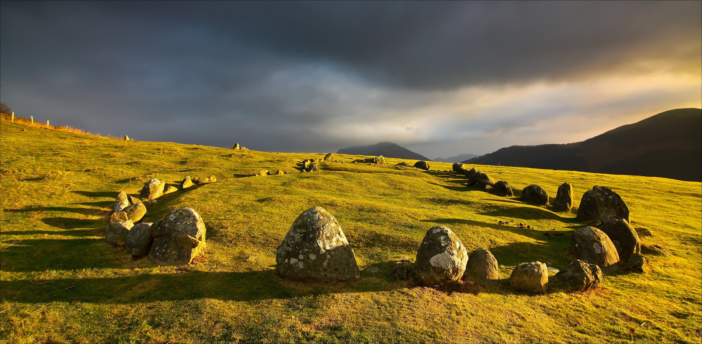 ky clouds hills stones nature mountain grass sunset