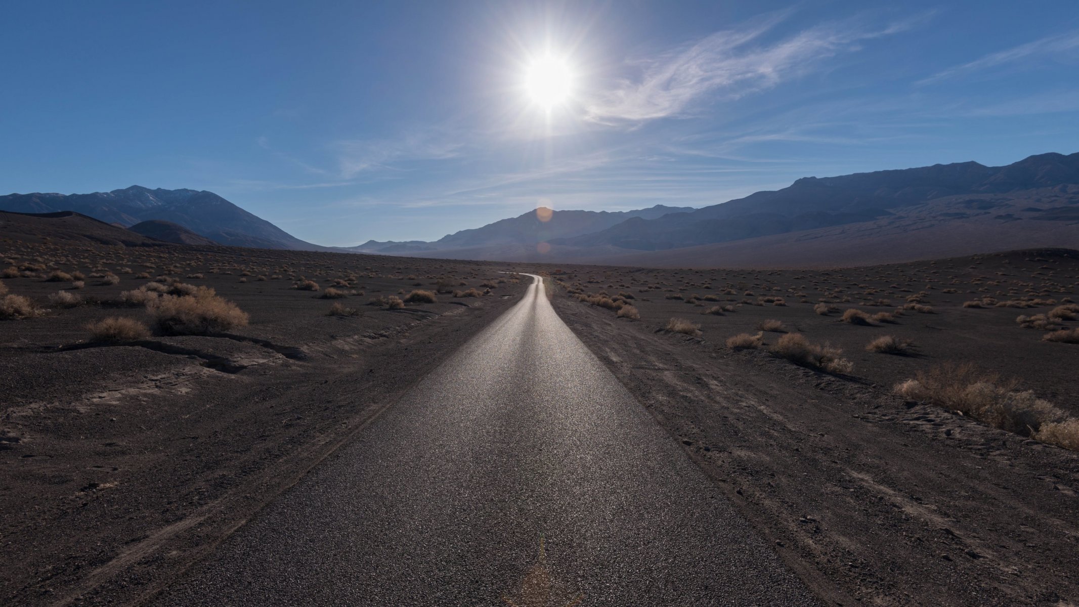 road mountain steppe light sun