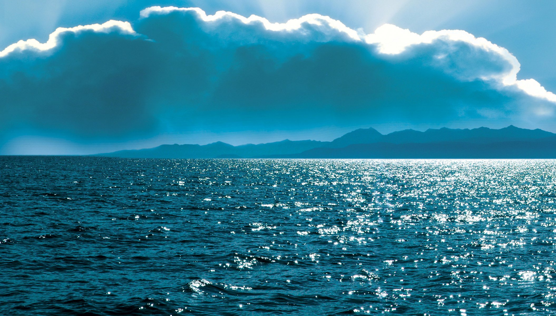 rusia baikal lago costa horizonte nubes rayos del sol azul