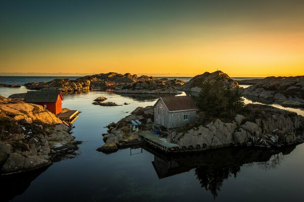 A small house on a stone island