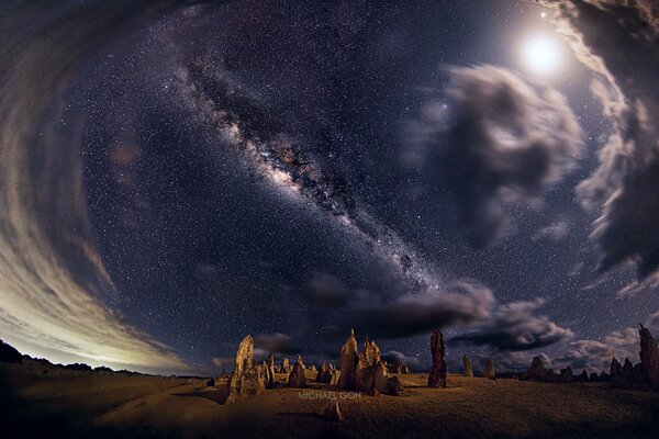 Night Milky Way among stars and rocks