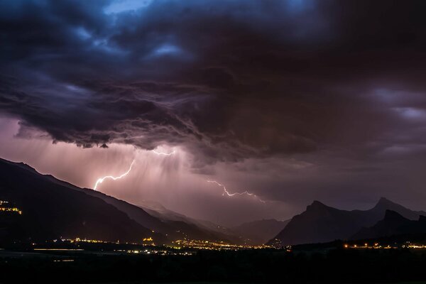 Thunderstorm over the night city