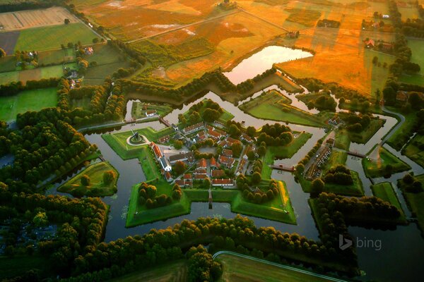 Bourtange , Netherlands, fort museum with a moat with water. Top view