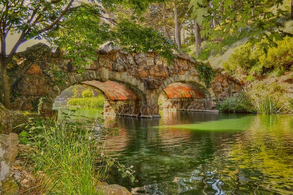 The river under the old stone bridge