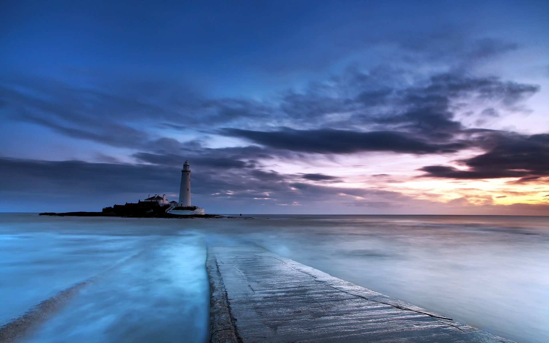 unset sea lighthouse