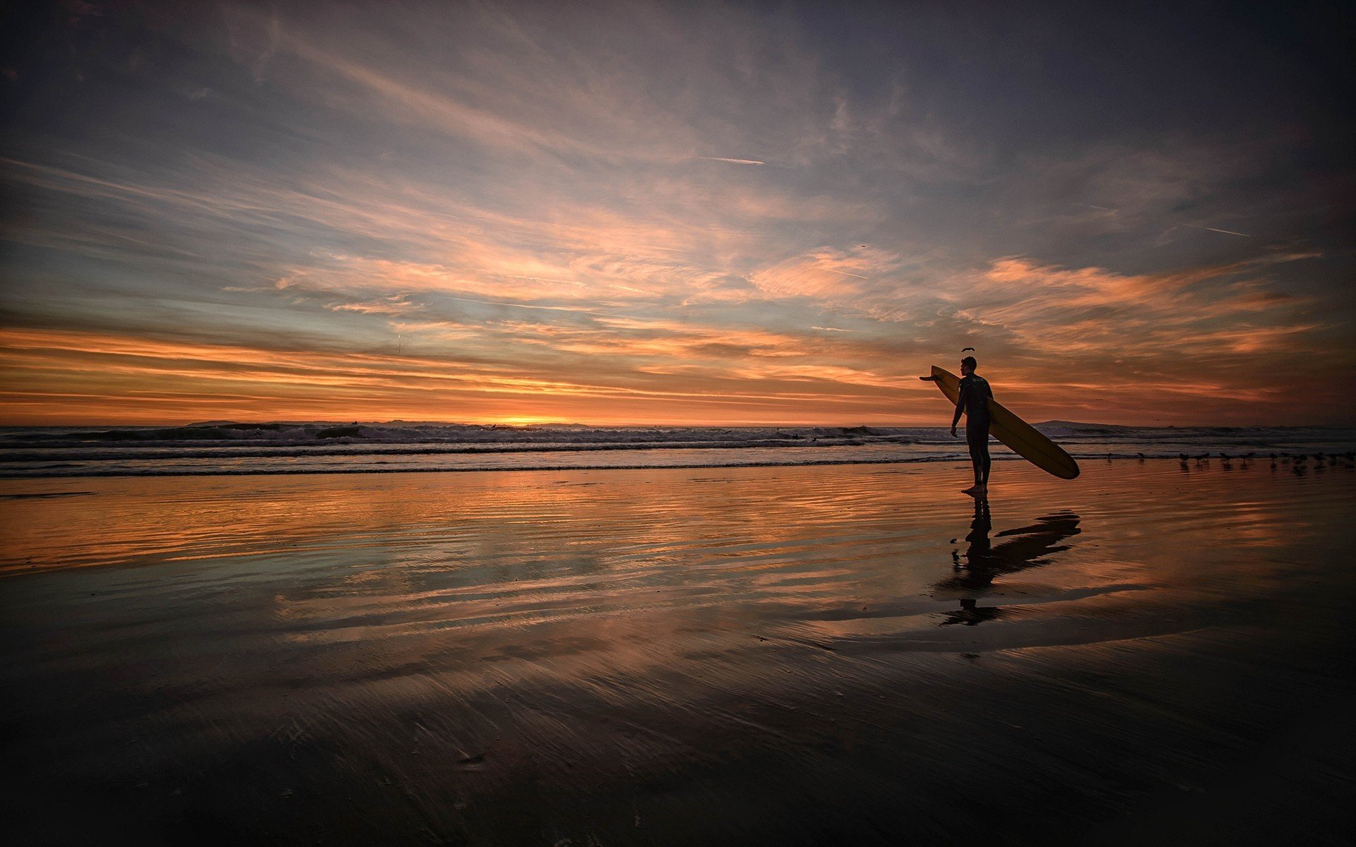 beach sand surfing board sky horizon the distance dawn