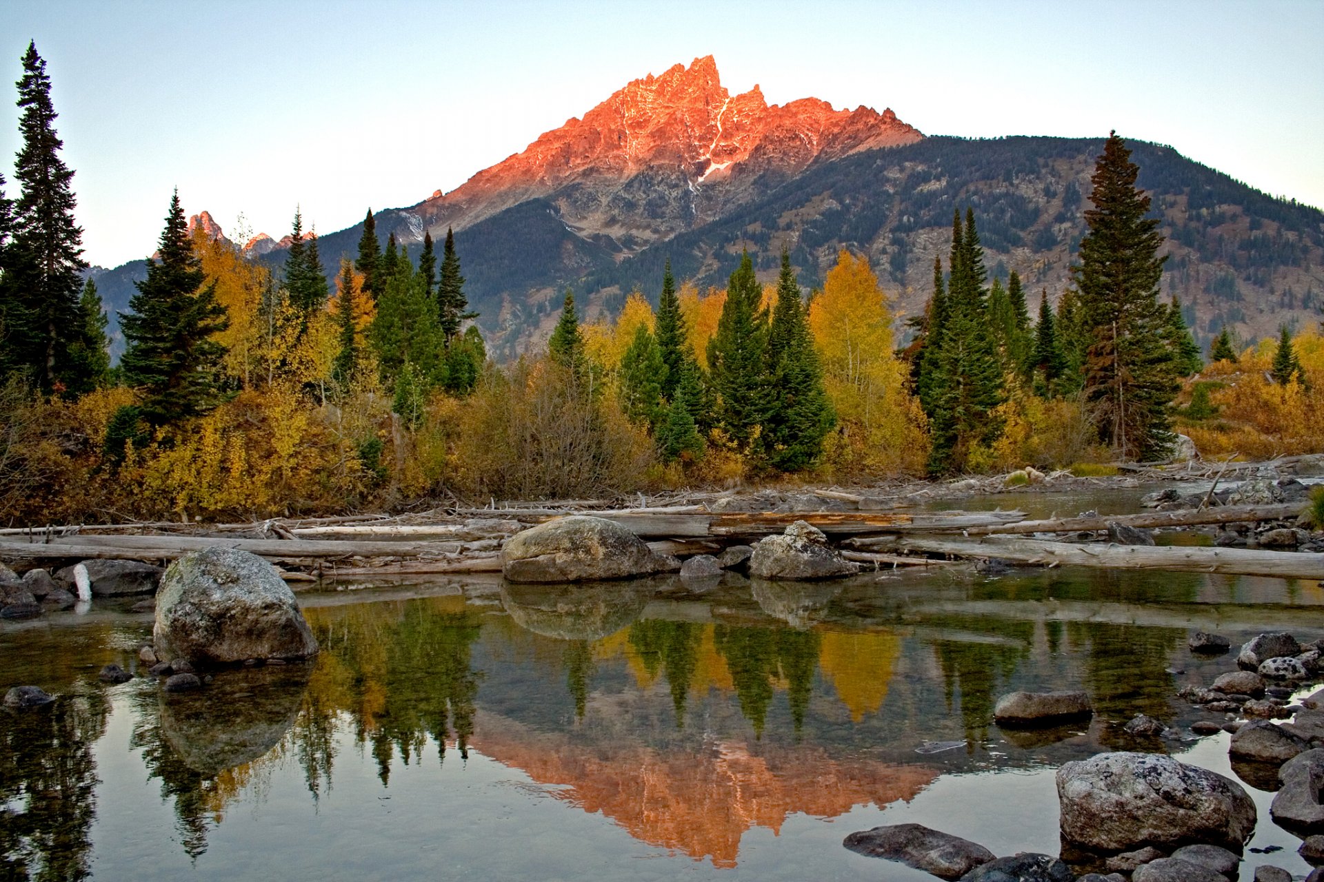 grand teton nationalpark wyoming usa himmel berge sonnenuntergang see reflexion bäume steine