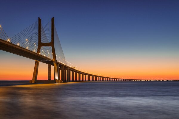 Orange long bridge over the river