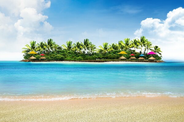 An island in the sea. A green island with bright beach umbrellas. Palm trees. Vacation