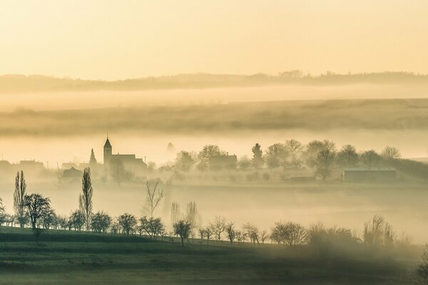 Foggy morning in a small village