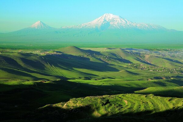 Volcano in a picturesque green valley