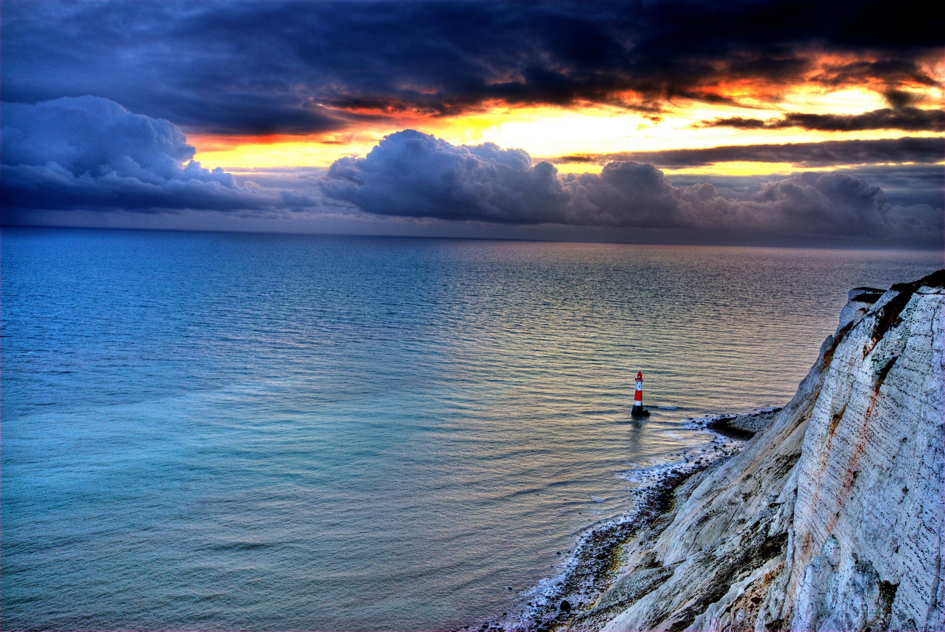 mar roca faro cielo nubes puesta de sol resplandor naturaleza