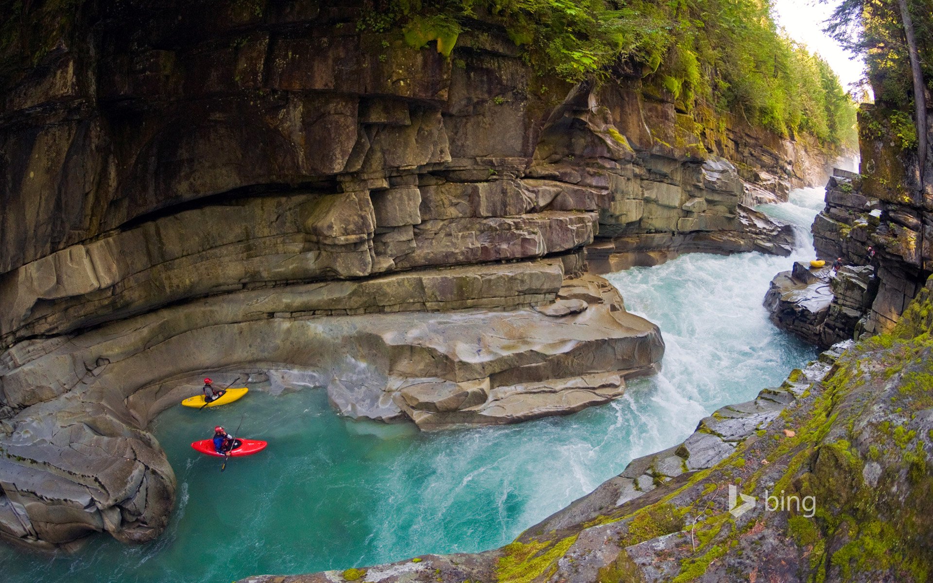 british columbia canada mountain valley canyon river rock stones boat