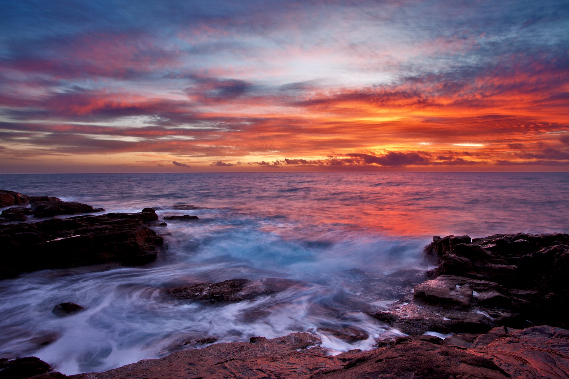 ea sky sunset clouds stones wave