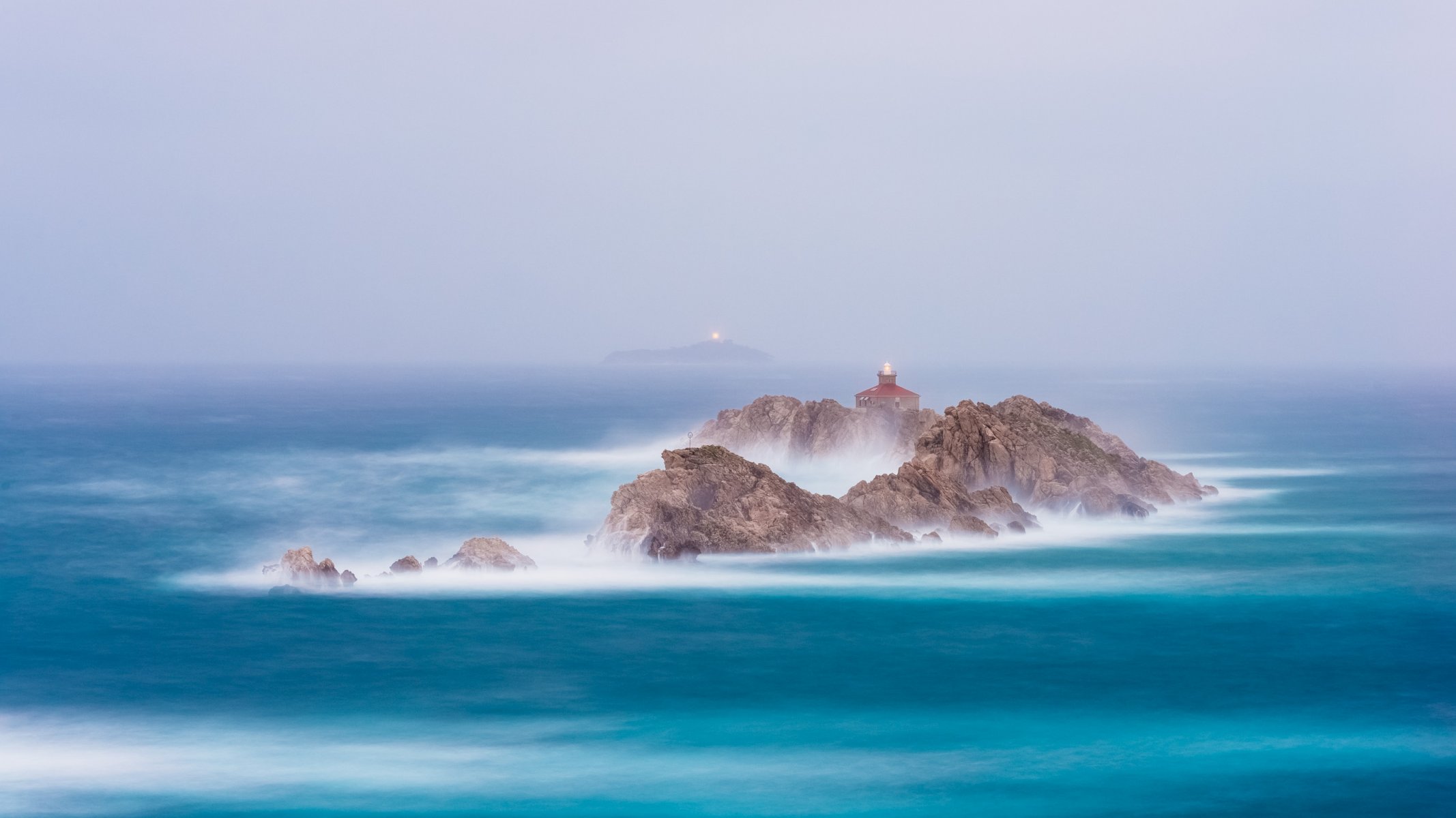 mare rocce fari esposizione