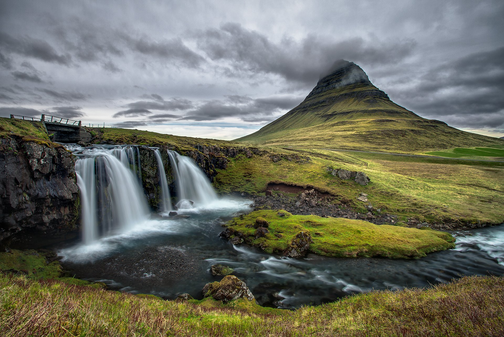 kirkjufell iceland sky clouds mountain river bridge waterfall stone