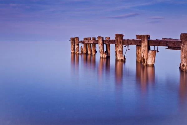 The sky merges with the lake on the horizon