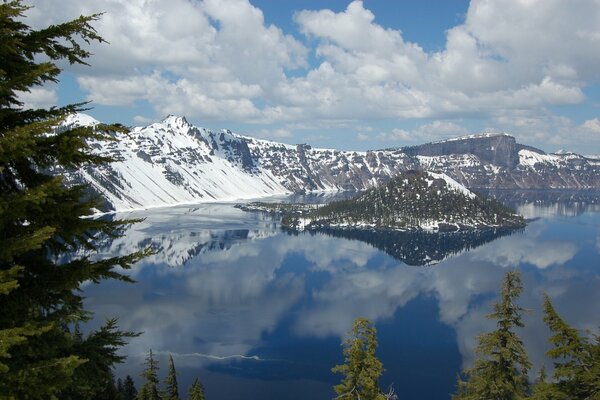 Crater Lake on Crater Lake Island is a national park with a reflection in it